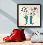 Lade das Bild in den Galerie-Viewer, a pair of red Dr. Martens boots, a gray polo shirt, and a framed illustration of two cartoon characters with thought bubbles, all placed on a wooden floor against a blue wall.
