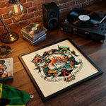 Lade das Bild in den Galerie-Viewer, a framed artwork depicting a colorful, intricate design with various symbols and text, placed on a wooden surface next to a record player and other music-related items.
