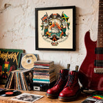Lade das Bild in den Galerie-Viewer, a wall with a framed artwork depicting a ship surrounded by various symbols, including a lion, a castle, and a cross. The wall is decorated with a collection of CDs, a pair of red boots, and a guitar.
