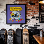 Cargar imagen en el visor de la galería, a wall with a framed cartoon-style illustration of a person lounging on a couch, surrounded by skateboards.
