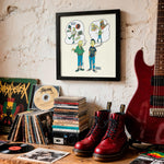 Lade das Bild in den Galerie-Viewer, a wall with a framed cartoon drawing of two people, a stack of CDs, a pair of red boots, and a guitar.
